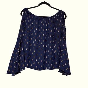 Navy floral print top with cut-out on sleeve. Size Medium